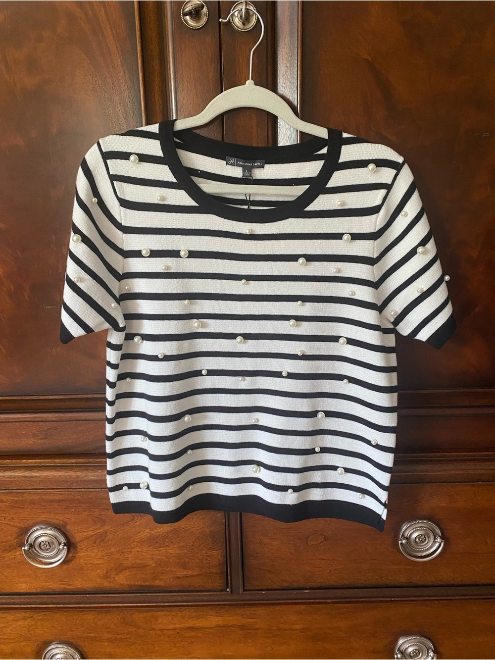 Adrianna Papel black/white sweater top with front/back pearls.